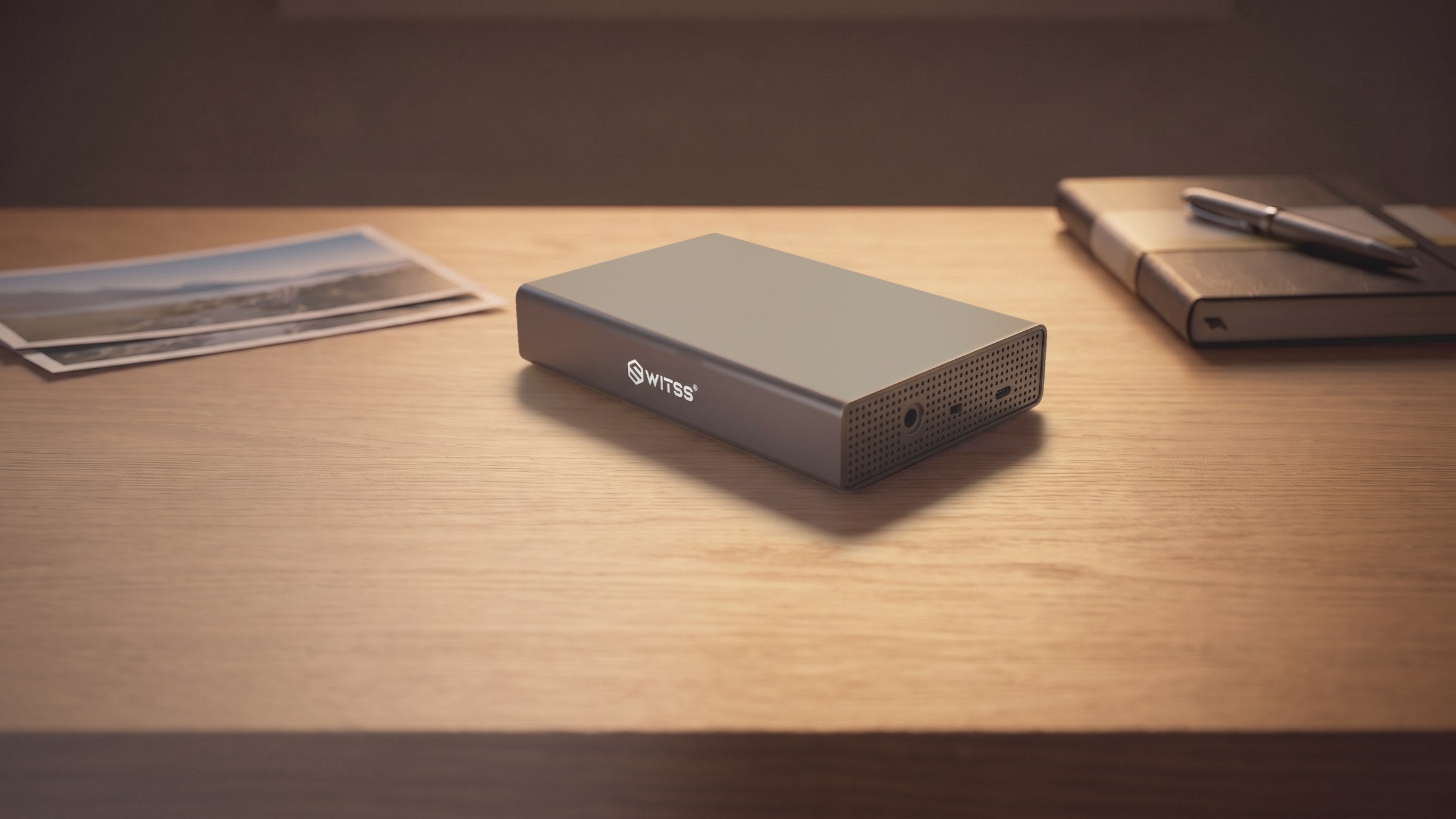 Switss® 3.5 inch enclosure on a wooden desk, lifestyle shot
