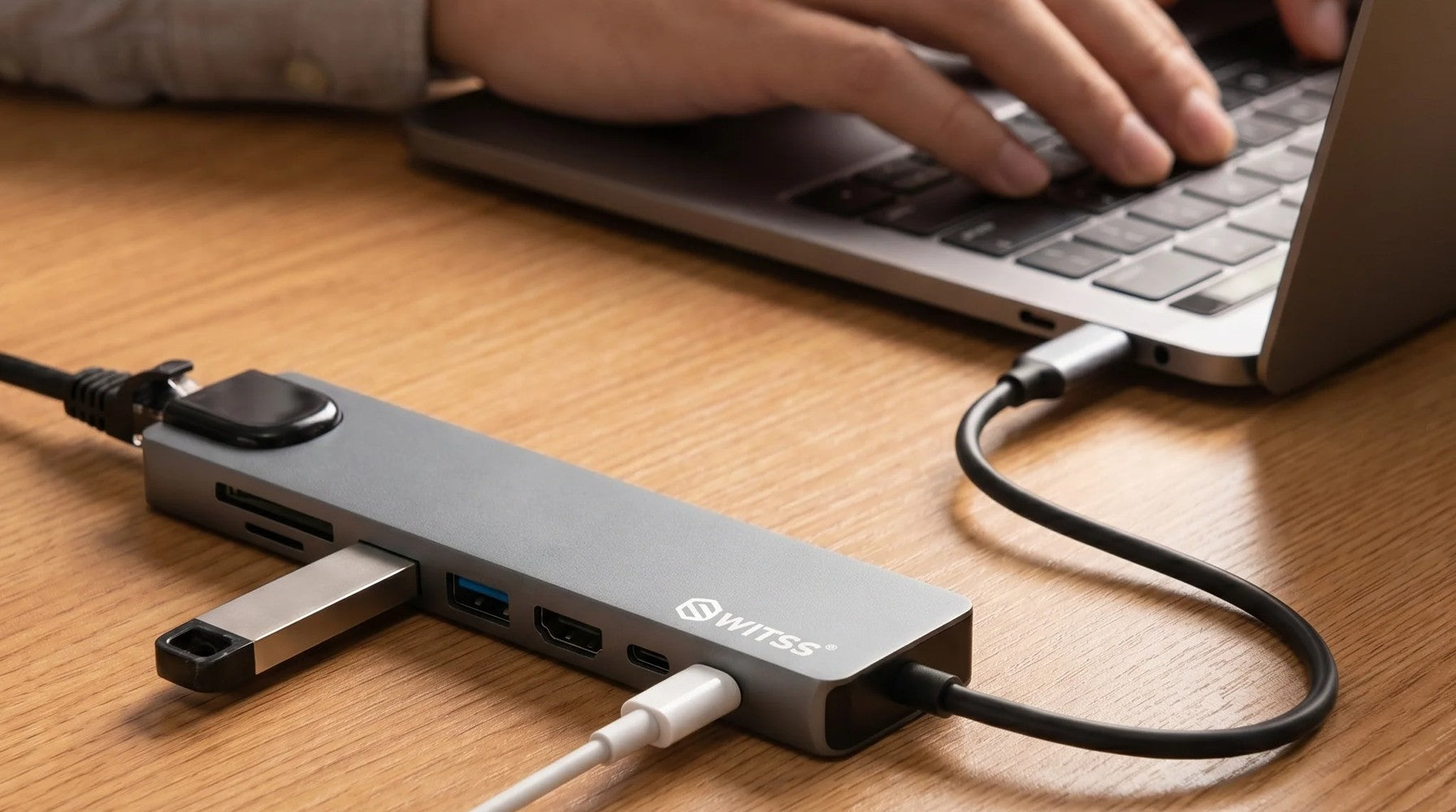 Switss® 8-in-1 USB-C hub in use, lifestyle shot