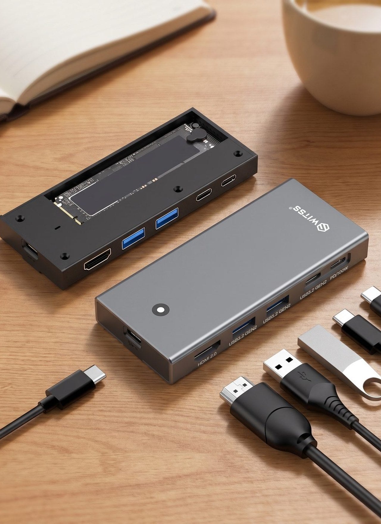 Le hub 5-en-1 Switss® relie un ordinateur portable avec un seul câble sur un bureau rangé