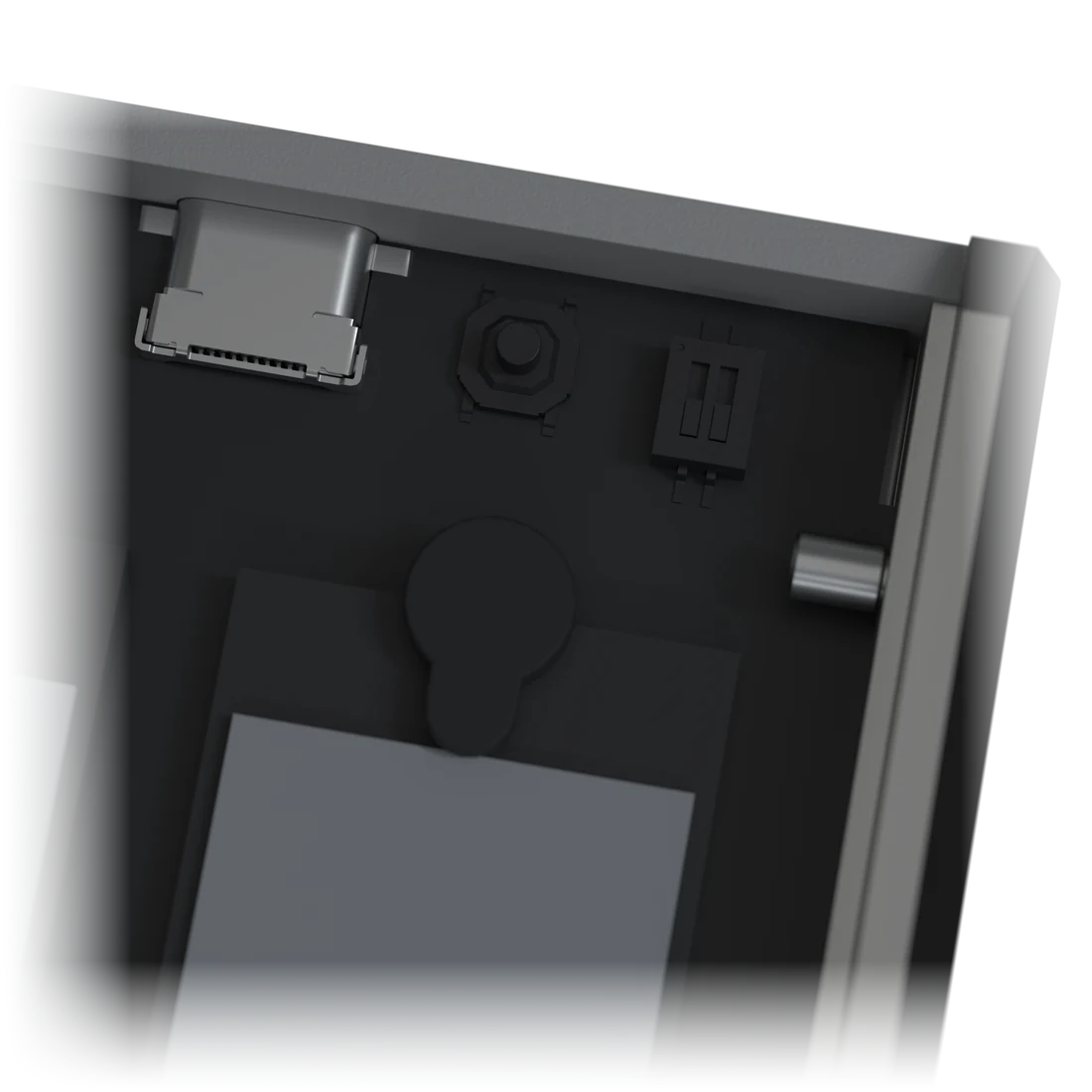 Close-up of the two sliders and the button inside, next to the connector