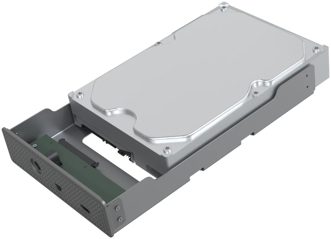 Frame with a 3.5 inch hard drive sliding onto the connector, with a ring around the connector