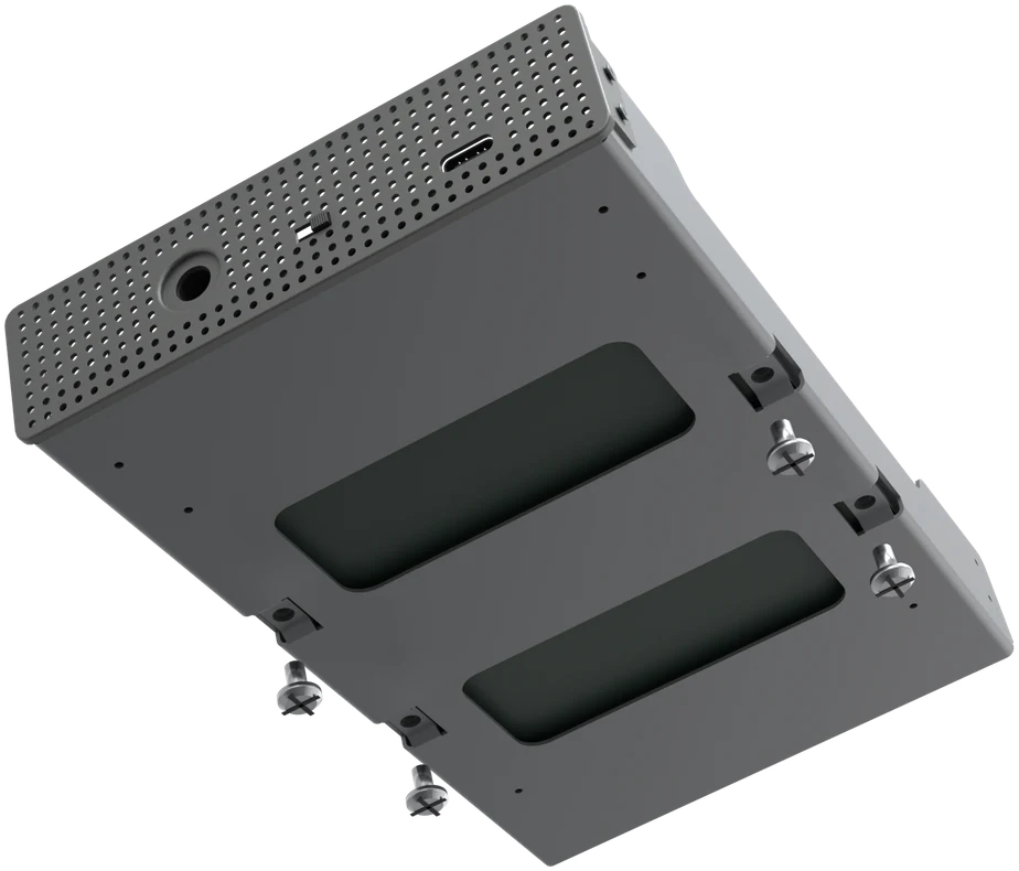Underside of the frame with the drive in it, with the screws below the mounting points in the base